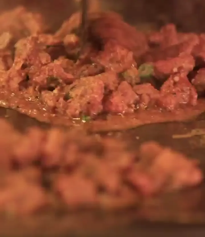 Food cooking on a flat griddle